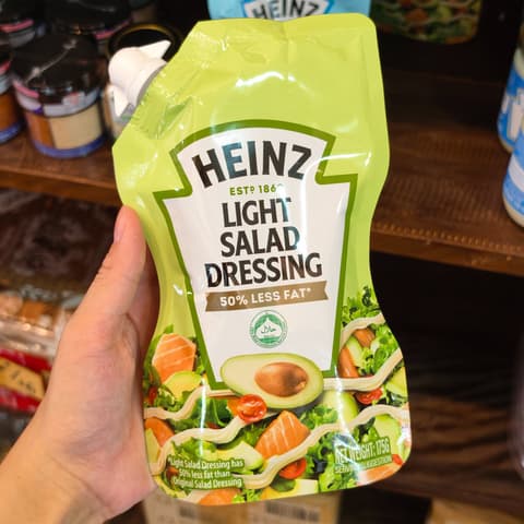 ສະຫຼັດລົດໄຂມັນ Light salad dressing 50℅ less fat 175g. Heinz