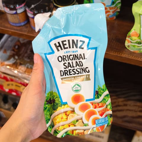 ສະຫຼັດລົດໄຂມັນ Original salad dressing 50℅ less fat 200g. Heinz